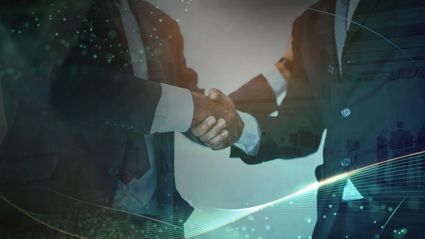 Business handshake symbolizing partnership in the live casino gaming industry, representing SA Gaming's partners.